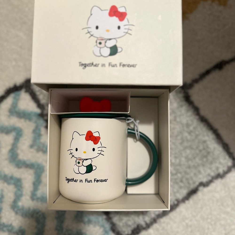 Starbucks Hello Kitty Mug with Green Handle